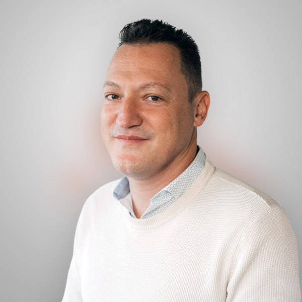 Professional headshot of Andrea Marchetti, Group Executive – Technology Enablement at Hyperclear