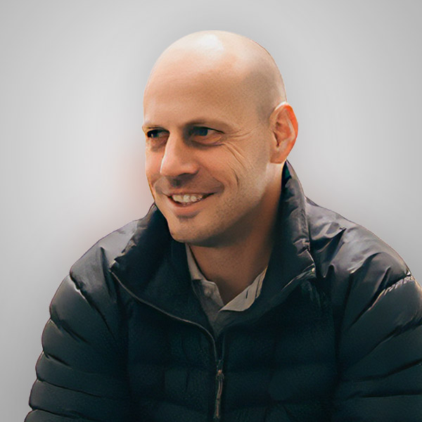 Professional headshot of Mark Tew, Group Executive – Hyperclear Tech at Hyperclear